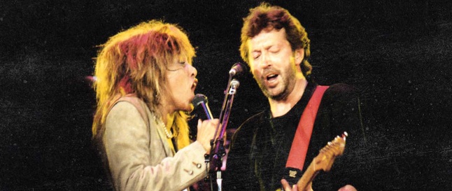 1987年，蒂娜·特纳和埃里克·克莱普顿在伦敦温布利体育场的舞台上演唱